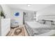 Inviting main bedroom with soft carpet, natural light, and stylish furnishings at 8968 Amelia Downs Trl, Kissimmee, FL 34747