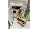 Smartly designed kitchen storage solution featuring pull-out shelving for pots, pans, and other kitchen essentials at 910 Spring Park St # 103, Celebration, FL 34747
