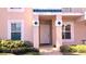 Close up of condo entrance and landscaping, showing the unit number and front door at 13840 Timberbrooke Dr # 103, Orlando, FL 32824