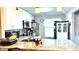 Well-appointed kitchen with white cabinetry, granite countertops, and stainless steel appliances at 13840 Timberbrooke Dr # 103, Orlando, FL 32824