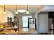 Well-appointed kitchen with white cabinetry, granite countertops, and stainless steel appliances at 13840 Timberbrooke Dr # 103, Orlando, FL 32824