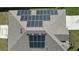 Roof aerial view showcasing solar panels, enhancing energy efficiency at 1061 Citrus Landings Blvd, Davenport, FL 33837