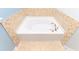 Close-up of bathtub with tile surround at 1061 Citrus Landings Blvd, Davenport, FL 33837