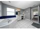 Bathroom with white tile flooring and vanity sink at 10937 Prairie Hawk Dr, Orlando, FL 32837