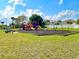 A vibrant playground offers a safe and fun environment for children to play and make new friends at 12450 Greco Dr, Orlando, FL 32824