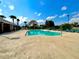 A refreshing community pool with lounge chairs offers a perfect spot to relax and enjoy sunny days at 12450 Greco Dr, Orlando, FL 32824
