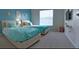Welcoming bedroom with two beds, plush carpeting, and modern lighting fixtures at 152 Moscato Dr, Davenport, FL 33897