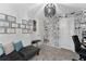 This bedroom features unique wall decorations, large windows, and is great as a home office or guest space at 1536 Mirabella Cir, Davenport, FL 33897