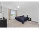 Comfortable bedroom features plush carpet, a neutral color palette, and ample closet space at 1536 Mirabella Cir, Davenport, FL 33897