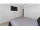 Comfortable bedroom featuring plush carpeting, closet, and neutral wall color at 1536 Mirabella Cir, Davenport, FL 33897