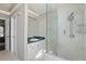 Bathroom showcasing a vanity, glass enclosed shower, and tile flooring at 1916 Nicholas Pl, St Cloud, FL 34771