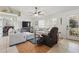 Comfortable living room with plush seating, a large window, and stylish decor at 1916 Nicholas Pl, St Cloud, FL 34771