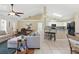 Inviting living space combining a living area, kitchen, and dining area, great for gatherings at 1916 Nicholas Pl, St Cloud, FL 34771