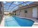 Screened-in pool area with an outdoor patio and access to the house at 1916 Nicholas Pl, St Cloud, FL 34771