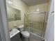 Updated bathroom with a shower and tub, a modern vanity, and sleek fixtures at 1937 Barksdale Dr, Orlando, FL 32822