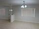 Bright living room with tile flooring, new paint and lots of natural light at 1937 Barksdale Dr, Orlando, FL 32822