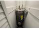 Image shows the water heater in a dedicated closet at 1937 Barksdale Dr, Orlando, FL 32822