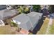 Aerial view of a single-Gathering home featuring a well-maintained roof and a cozy front porch at 2320 Amherst Ave, Orlando, FL 32804