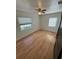 Bedroom featuring natural light from two windows and a ceiling fan at 2320 Amherst Ave, Orlando, FL 32804
