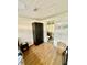 Bright bedroom with wardrobe, side table, and adjoining bathroom at 2320 Amherst Ave, Orlando, FL 32804