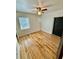 Bedroom featuring natural light from a window and a ceiling fan at 2320 Amherst Ave, Orlando, FL 32804