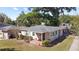 Charming single-Gathering home featuring a cozy front porch and well-maintained landscaping at 2320 Amherst Ave, Orlando, FL 32804