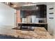 Modern kitchen featuring an island with granite countertops and stainless steel appliances at 2320 Amherst Ave, Orlando, FL 32804