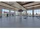 Spacious gym featuring modern exercise equipment and large windows offering scenic views at 2658 Meadowedge Loop, St Cloud, FL 34772