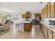 Spacious kitchen featuring a large island, stainless steel appliances, and ample cabinet space for storage at 2658 Meadowedge Loop, St Cloud, FL 34772