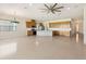 A spacious kitchen features wood cabinets, a large island, and modern appliances at 2658 Meadowedge Loop, St Cloud, FL 34772