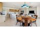Spacious open-concept kitchen and dining area, perfect for modern living and entertaining guests at 2658 Meadowedge Loop, St Cloud, FL 34772