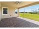The covered patio has brick pavers and a beautiful view of the community at 2658 Meadowedge Loop, St Cloud, FL 34772