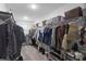 Walk-in closet featuring extensive shelving, hanging space, and organized storage solutions at 2724 Camden Ln, Davenport, FL 33837