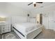 Comfortable bedroom with a large bed, soft carpet, and ample closet space at 2885 Attwater Loop, Winter Haven, FL 33884