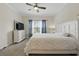 Bright bedroom with large windows, plush carpet, and calming decor at 2885 Attwater Loop, Winter Haven, FL 33884