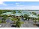 Community clubhouse near a lake offering picturesque views and a recreational setting at 2885 Attwater Loop, Winter Haven, FL 33884