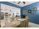 Cozy dining room adjacent to the kitchen offers seamless entertaining at 2885 Attwater Loop, Winter Haven, FL 33884