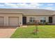 Charming single-story home with a well-manicured lawn and an attached one car garage at 2885 Attwater Loop, Winter Haven, FL 33884