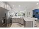 Spacious kitchen featuring stainless steel appliances and an open floor plan at 2885 Attwater Loop, Winter Haven, FL 33884