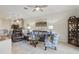 Inviting living room features modern furniture, open to a bright, airy kitchen at 2885 Attwater Loop, Winter Haven, FL 33884