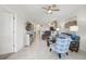 Spacious living room with an open floor plan that connects to the dining area at 2885 Attwater Loop, Winter Haven, FL 33884
