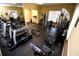 Well-equipped fitness center with treadmills, elliptical, and weight machines at 2926 Siesta View Dr, Kissimmee, FL 34744