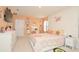 Cozy bedroom with decorative peach walls, a comfortable bed, and lots of storage space at 297 Gina Ln, Davenport, FL 33837