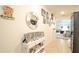 Inviting hallway showcases an arched doorway with views of the dining and living spaces at 297 Gina Ln, Davenport, FL 33837