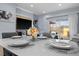 Elegant dining room with a well-set table, perfect for entertaining and Gathering meals at 3055 Yellow Lantana Ln, Kissimmee, FL 34747