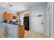 A delightful kitchen featuring granite countertops and black appliances at 3055 Yellow Lantana Ln, Kissimmee, FL 34747