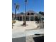 Community clubhouse with landscaped entrance and inviting walkway, perfect for gatherings and events at 3100 Parkway Blvd # 325, Kissimmee, FL 34747
