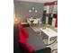 Open-concept living room and kitchen area with modern decor at 3100 Parkway Blvd # 325, Kissimmee, FL 34747
