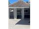 Covered patio with comfortable seating, creating an inviting outdoor space for relaxation and entertainment at 3100 Parkway Blvd # 325, Kissimmee, FL 34747