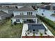 Aerial view of a home showcasing the backyard, gazebo, and patio areas at 3262 Hanging Tide St, Winter Garden, FL 34787